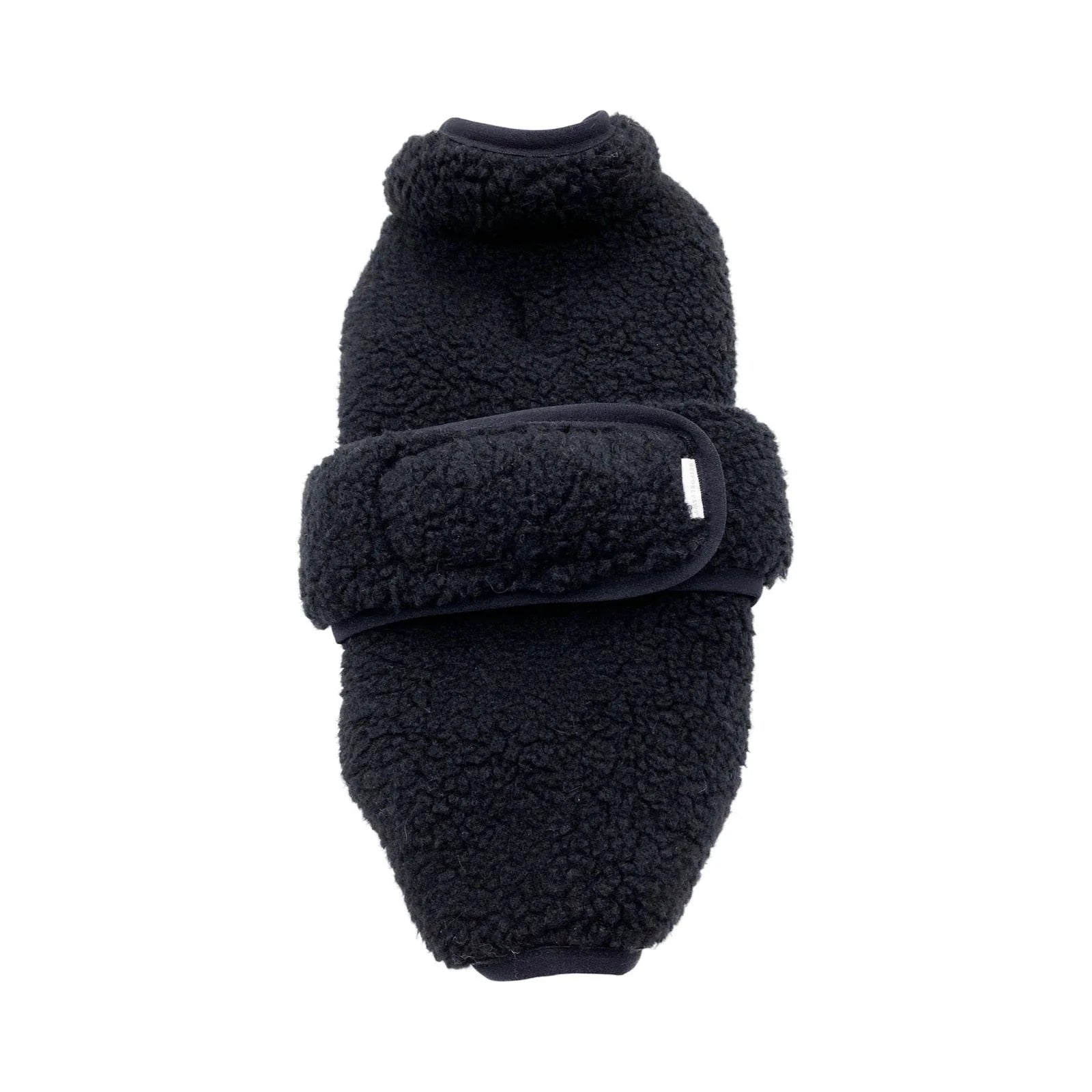 Cozy black faux shearling vest with adjustable strap, designed for warmth and comfort in chilly weather.