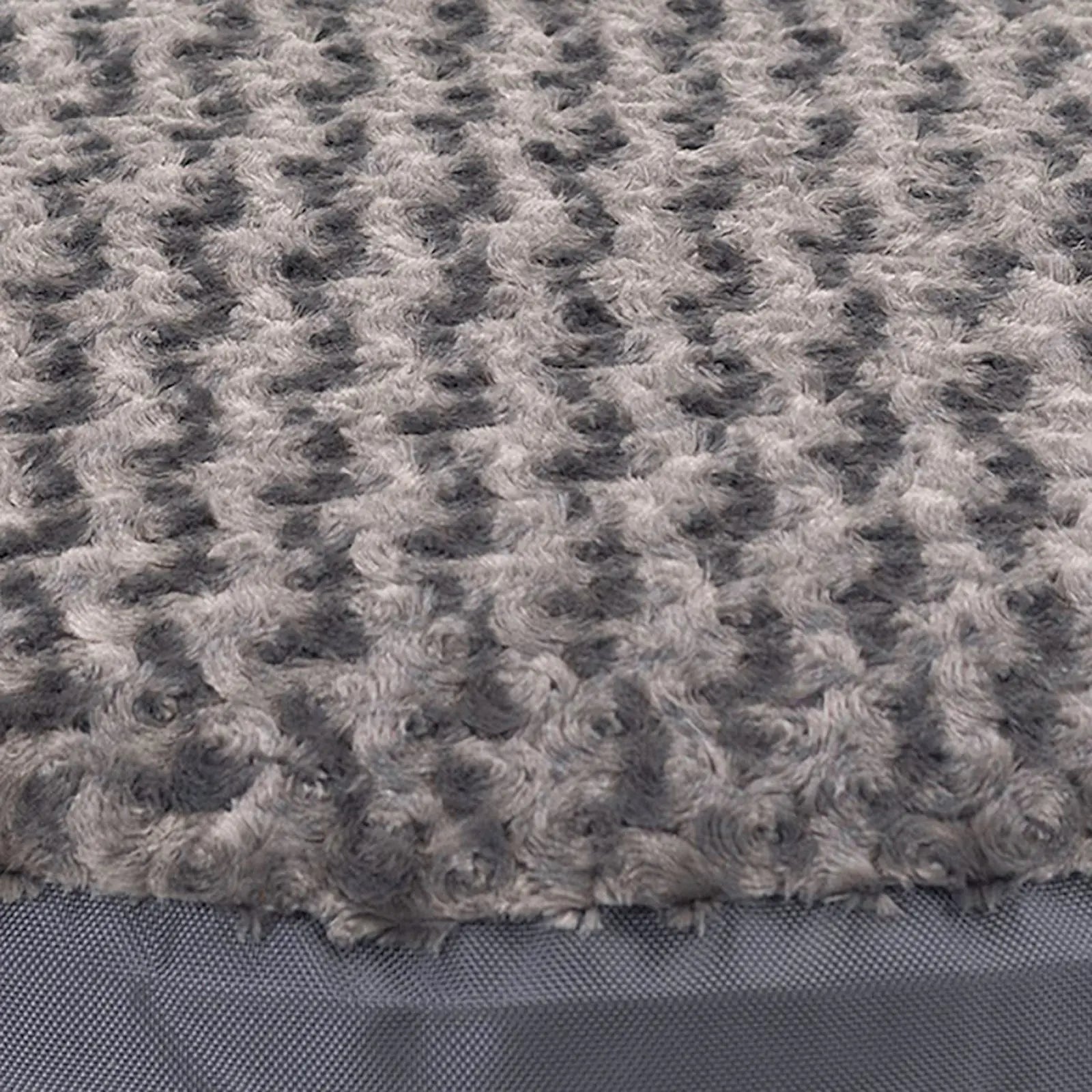Soft gray Minky Fleece crate pad with a unique textured surface, designed for comfort and durability.