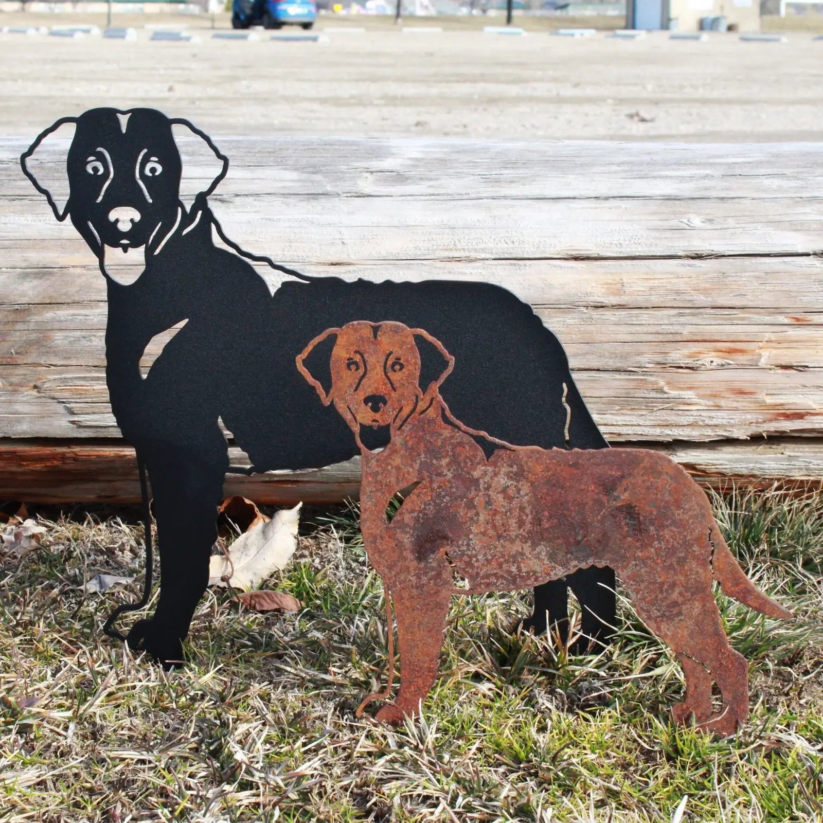 Curly Coated Retriever metal silhouette in black and rusted Corten steel, showcasing outdoor dog decor craftsmanship.