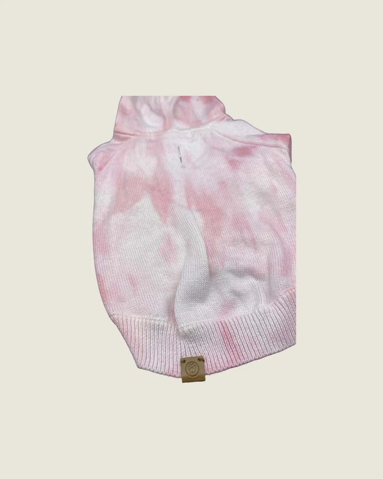 Soft cotton and cashmere dog hoodie in a pink tie-dye pattern with a hood and leash-access buttonhole, designed for comfort.