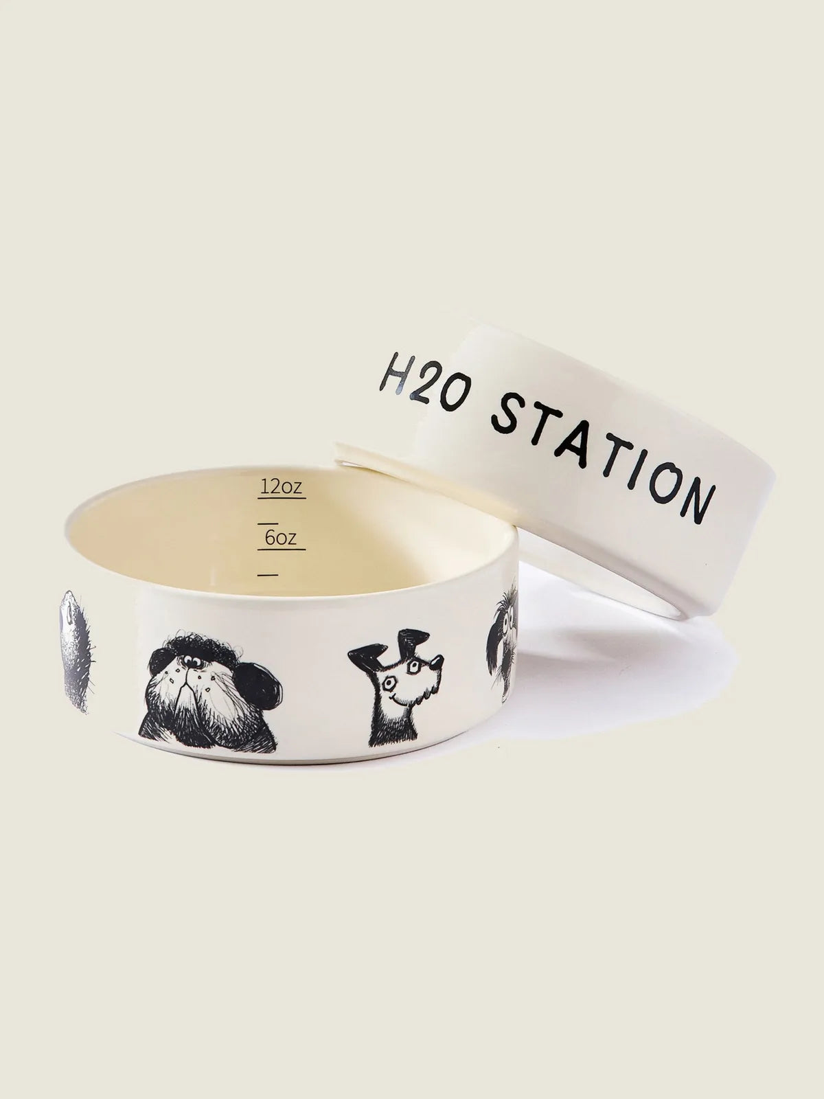 Ceramic pet bowl with playful dog illustrations and "H2O STATION" text, featuring a non-slip base for stability.
