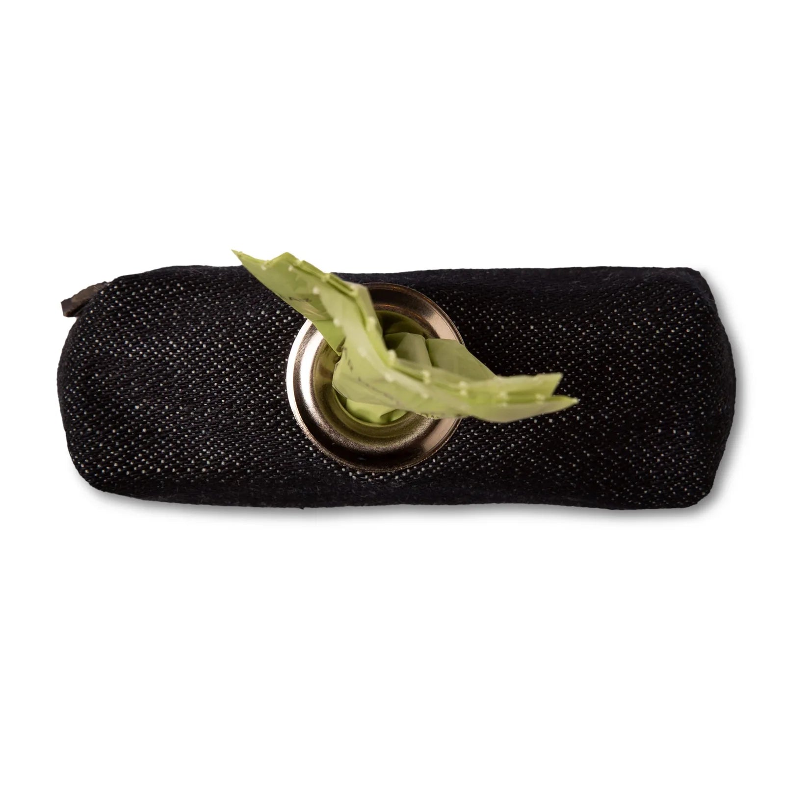 Compact black denim dog bag holder with a brass grommet and green poop bags partially visible.