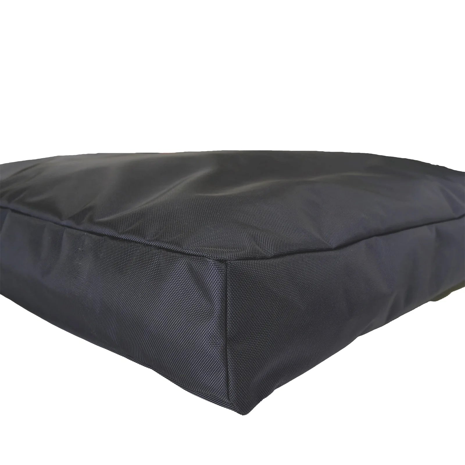 Durable black orthopedic dog bed made from rugged nylon fabric, featuring a thick, supportive mattress for comfort.