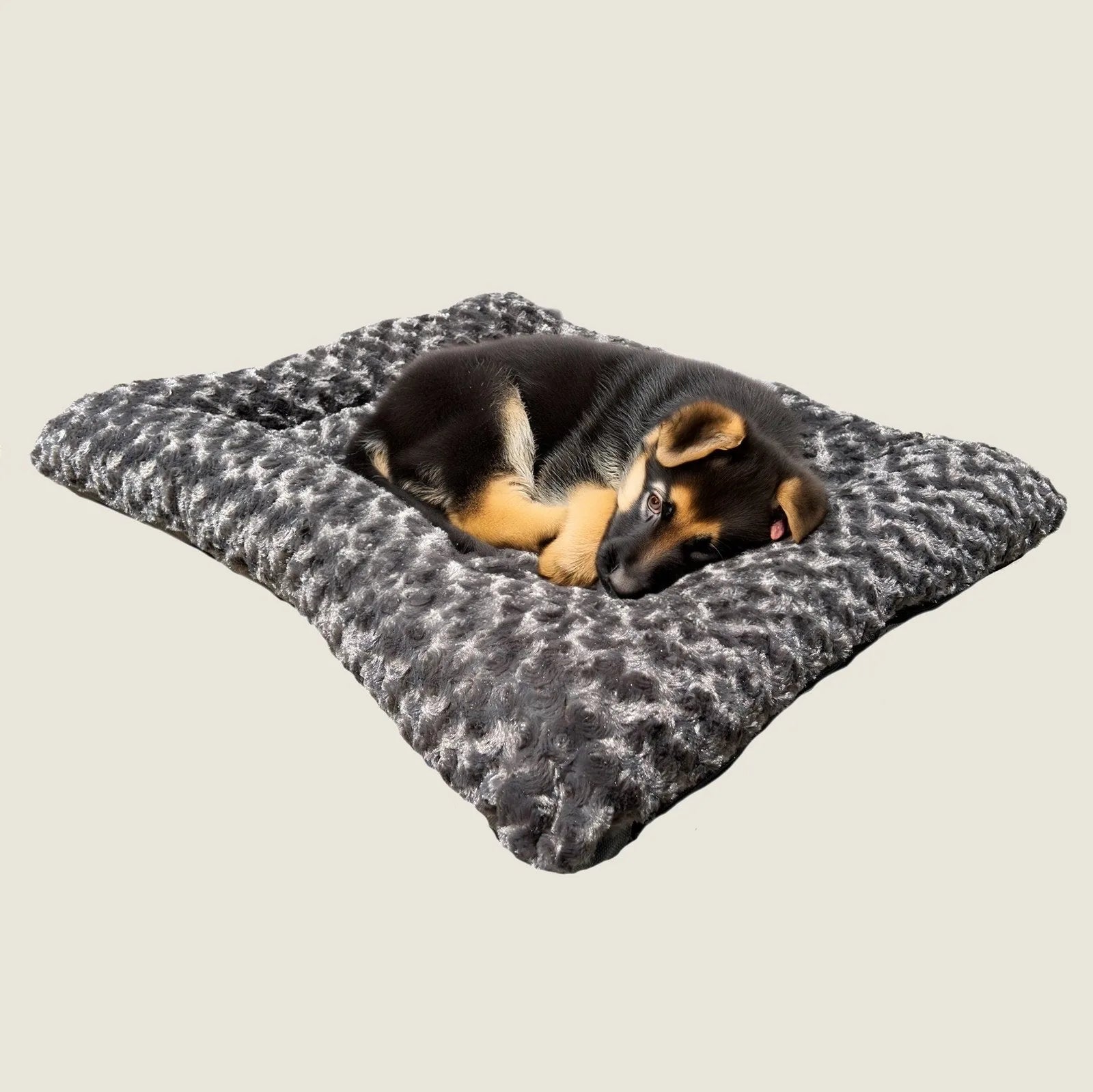 Cozy black bolstered dog bed with textured fur and a resting puppy, showcasing the Furvana™ 'Cloud' design.