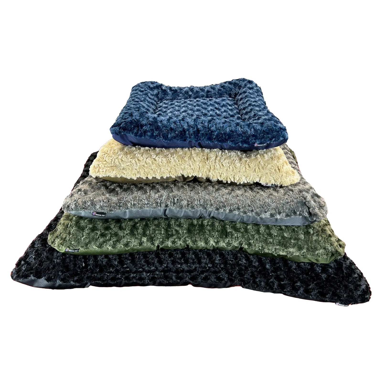 Rectangle bolstered Furvana™ dog bed stack in navy, cream, gray, olive, and black, featuring soft, curly-pile texture.