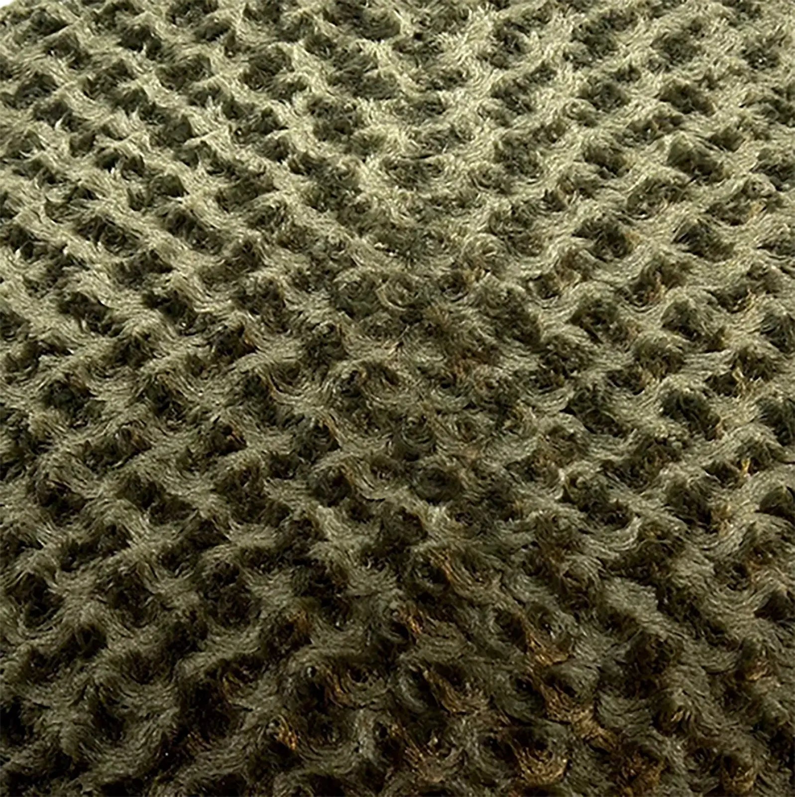 Close-up of a textured olive green dog bed cover featuring a soft, plush material designed for comfort and durability.