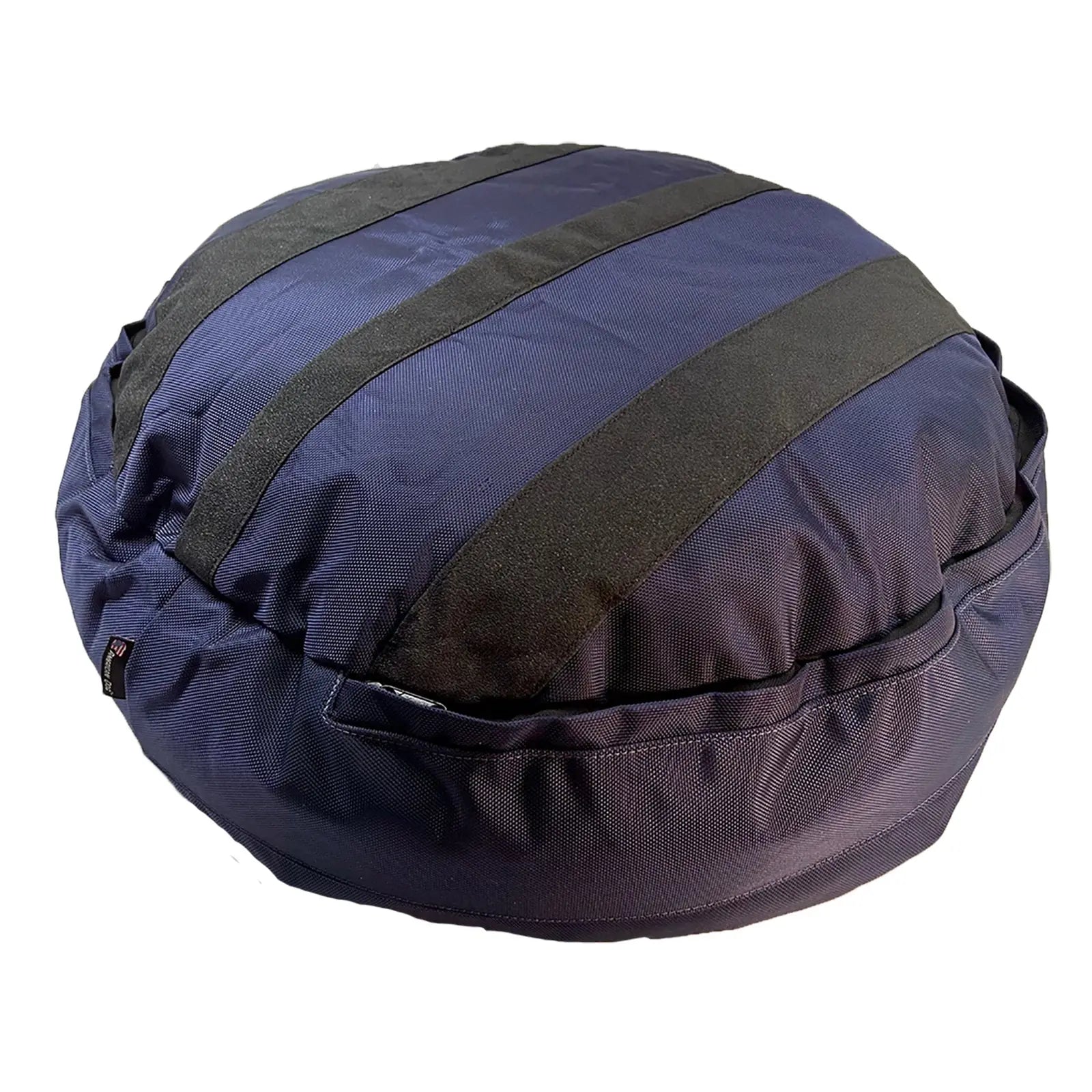 Round, navy dog bed with black stripes, made from durable fabric, featuring bolstered sides for comfort.