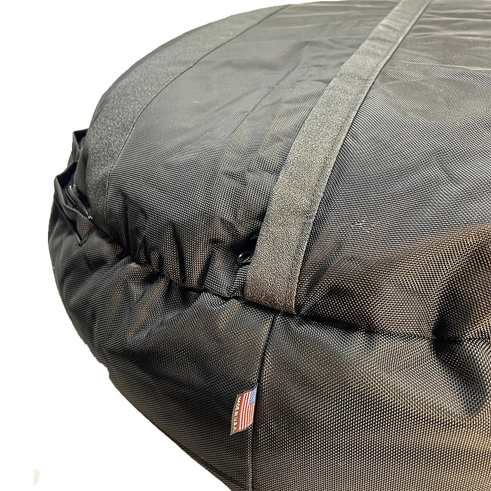 Close-up of the black nylon ballistic fabric of the American Dog bed, showcasing its durable and rugged design.