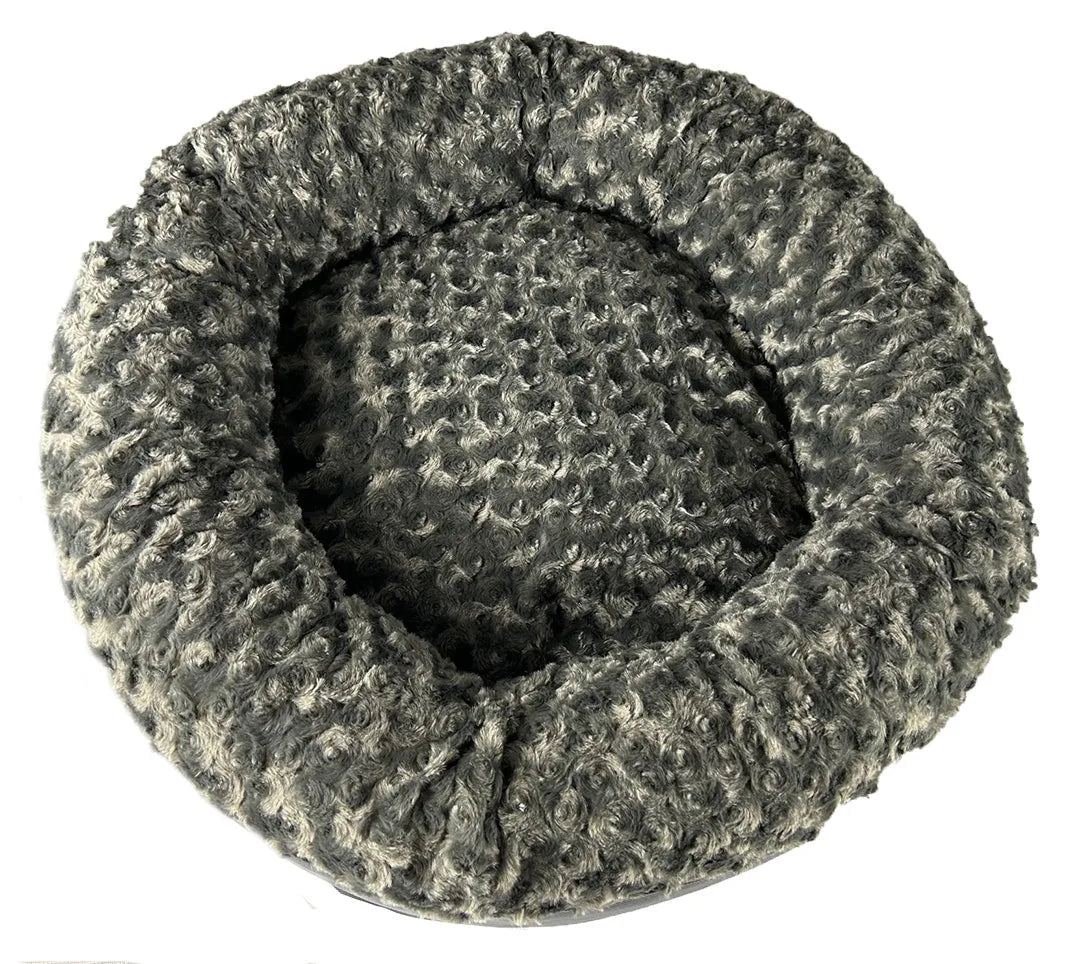 Round bolstered dog bed in charcoal gray, featuring a soft fleece cover and cozy, nest-like design for comfort and security.