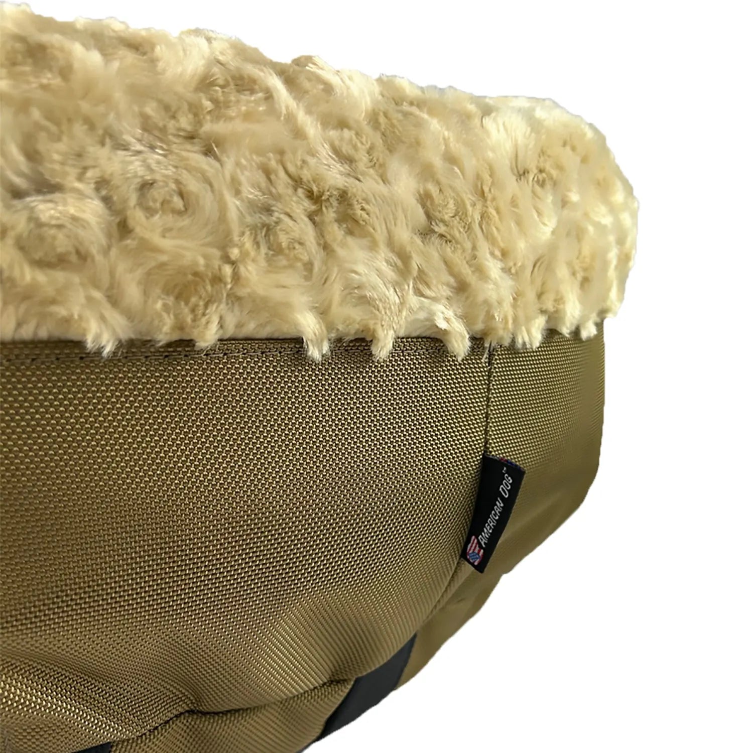 Round bolstered dog bed in camel with soft, plush fleece top and durable nylon bottom, designed for comfort and support.