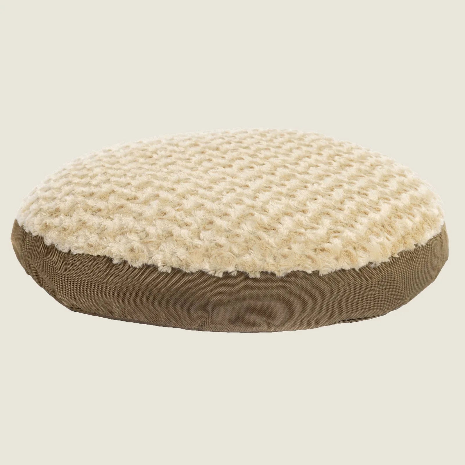 Round Furvana Dog Bed featuring a cozy cream Minky Rose Fleece top and durable camel nylon bottom. Ideal for snuggling.