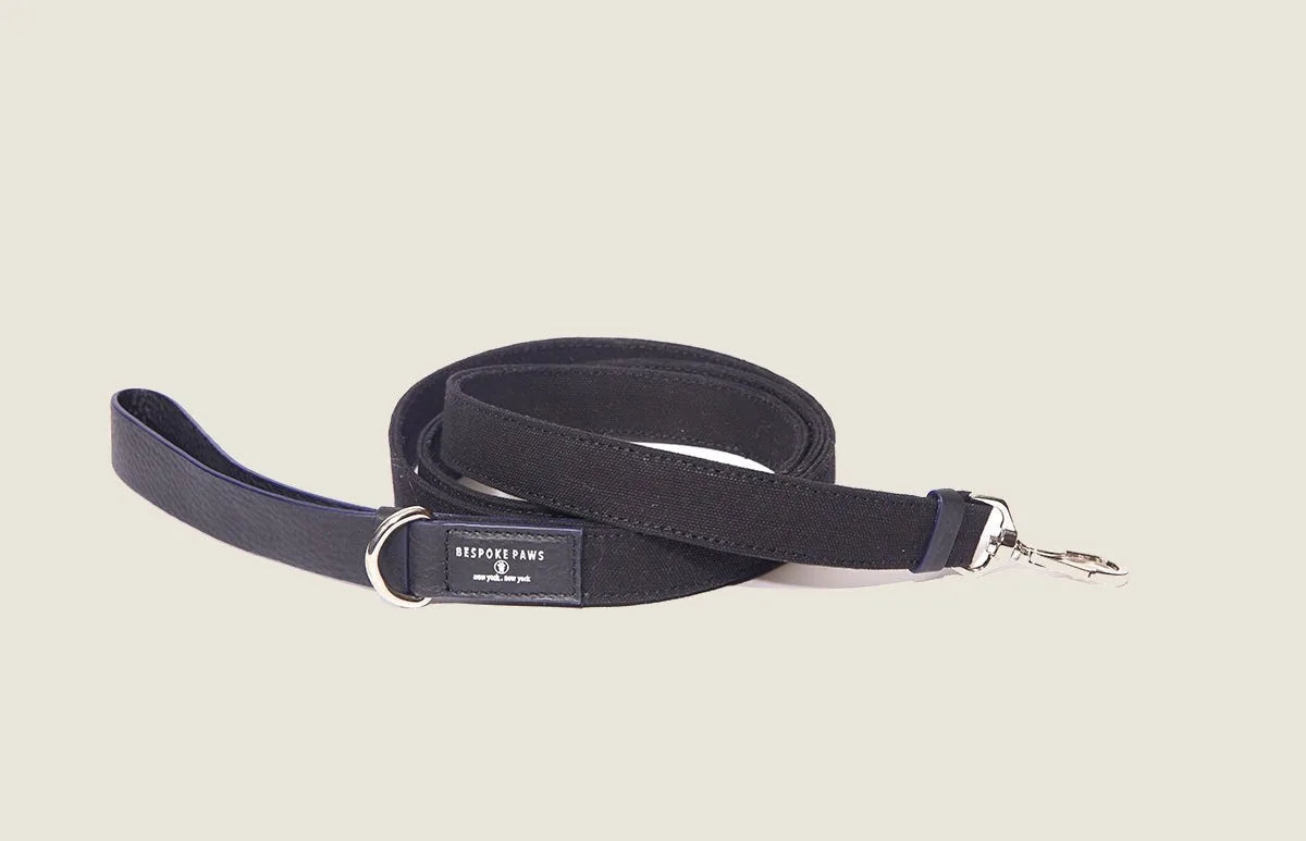 Black canvas and leather combo dog leash by BESPOKE PAWS, featuring a sturdy clasp and comfortable grip.