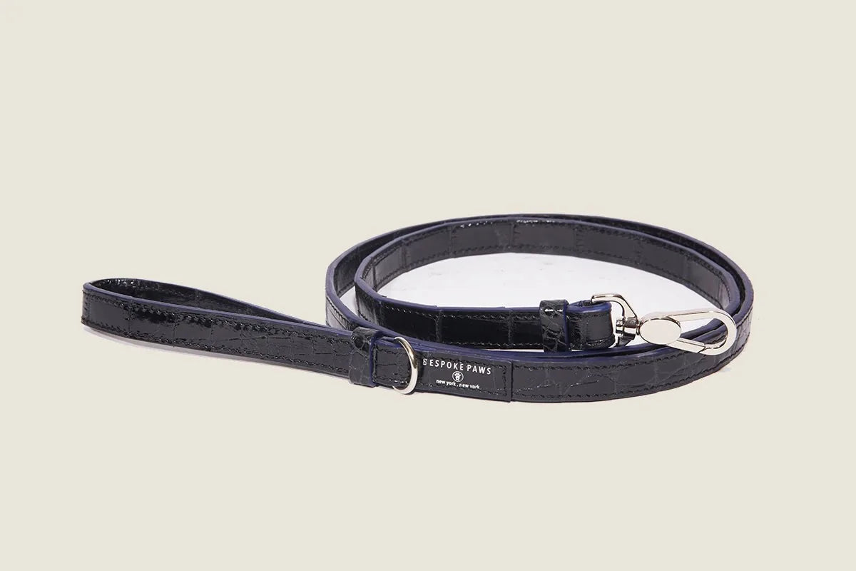 Black patent dog leash with alligator pattern, featuring a secure metal clasp and sleek design, ideal for small breeds.