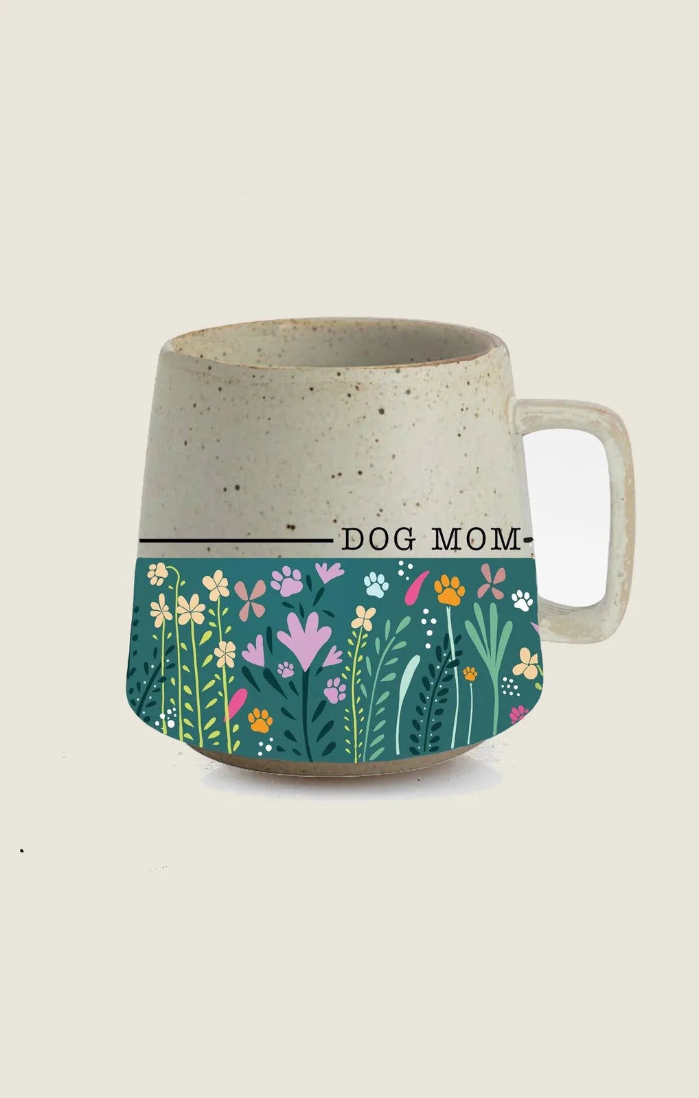 Ceramic "Dog Mom" mug featuring a floral design and hidden dog prints, perfect for dog lovers.