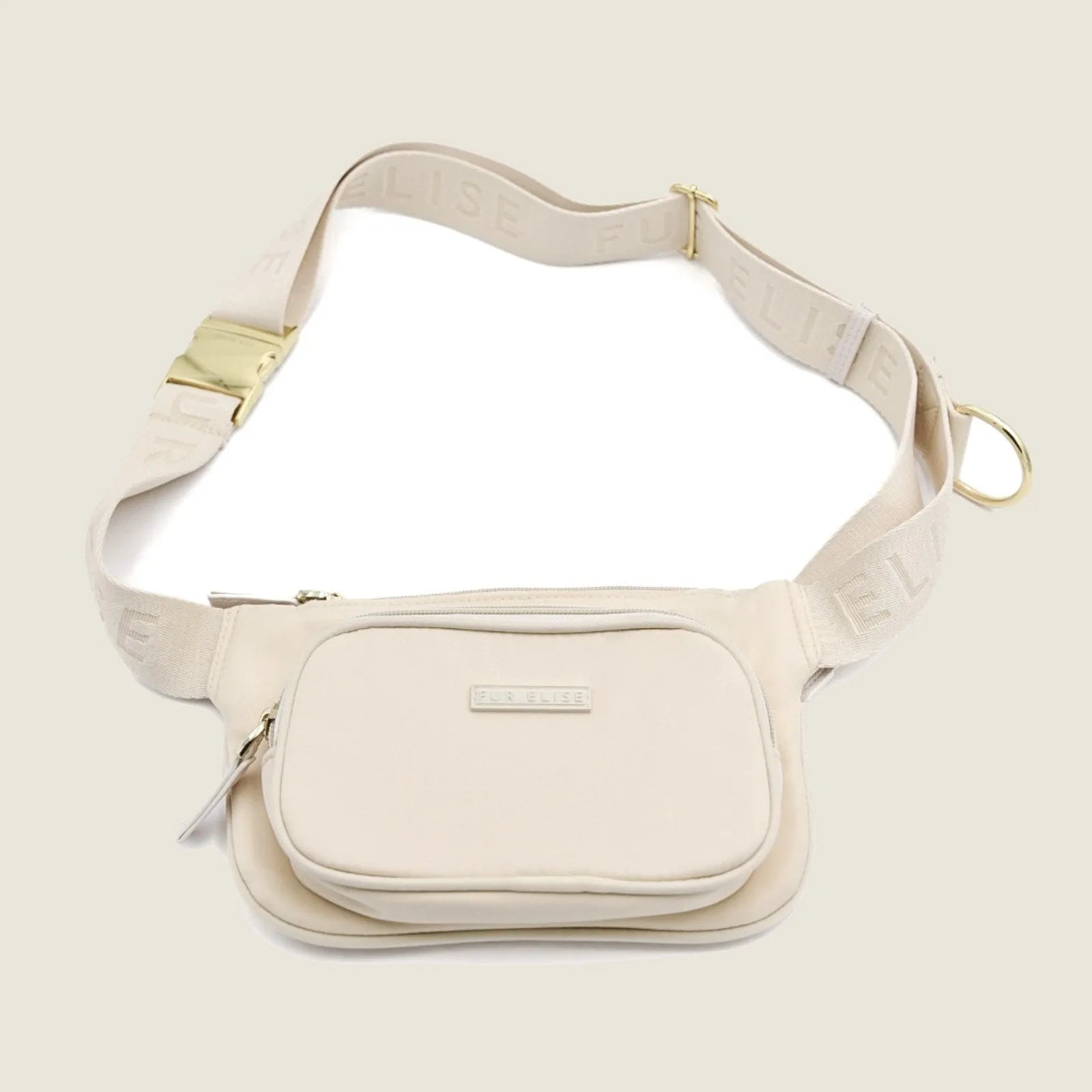 Beige lightweight dog walking bag with adjustable strap, dual zip pockets, and gold hardware details.