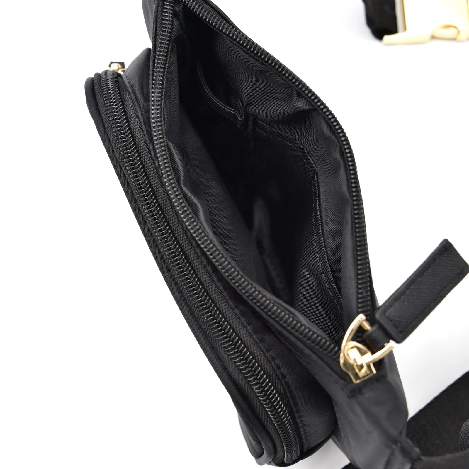 Interior view of the Dog Walking Bag in Noir, showcasing its lightweight black nylon fabric and organized pocket layout.