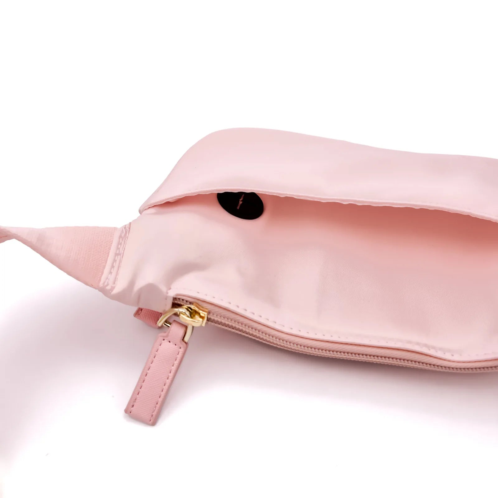 Light pink nylon belt bag with a gold zipper and concealed pouch, perfect for dog walking essentials.