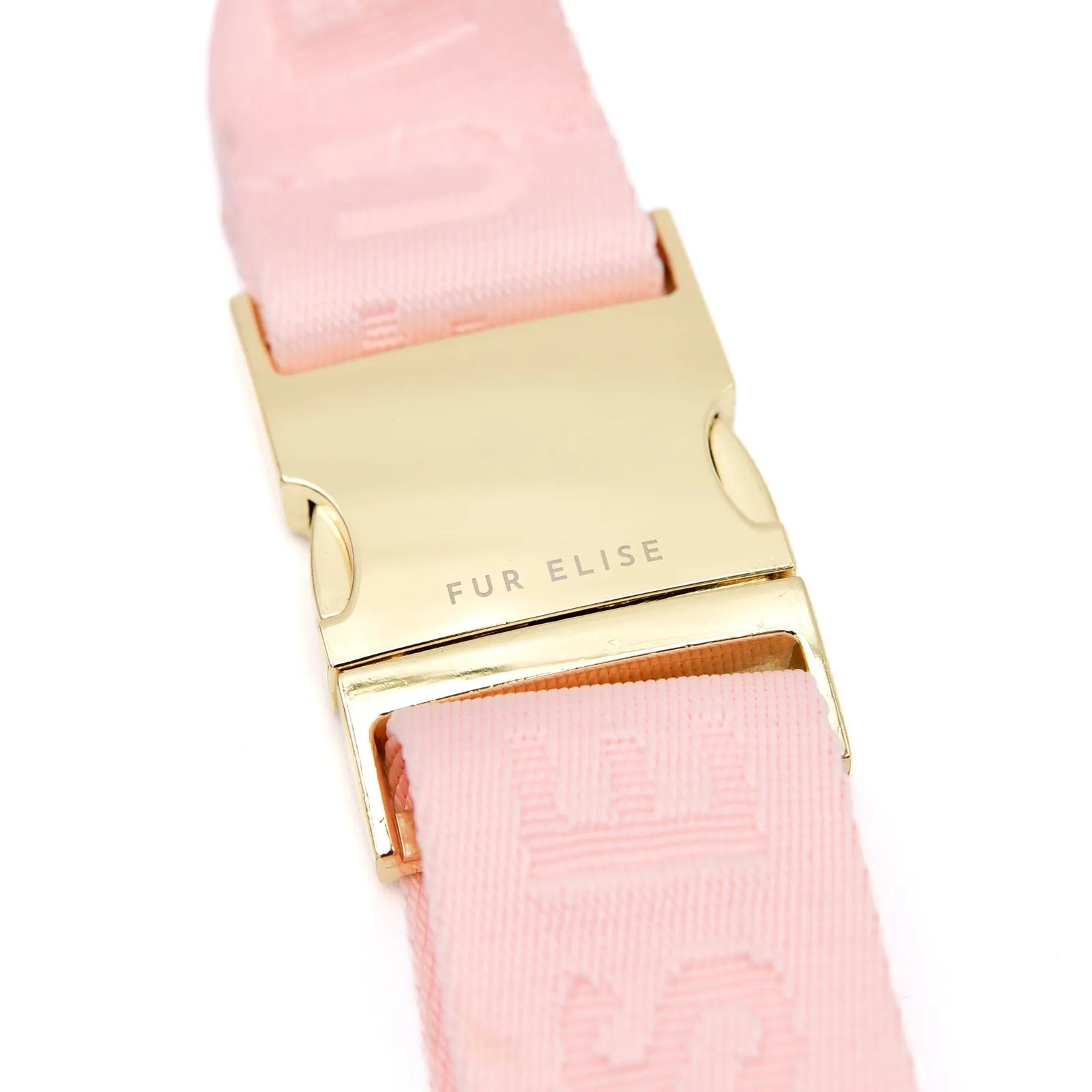 Gold buckle with "FUR ELISE" on a light pink adjustable belt strap. Perfect for the Elise Galleria Dog Walking Bag.