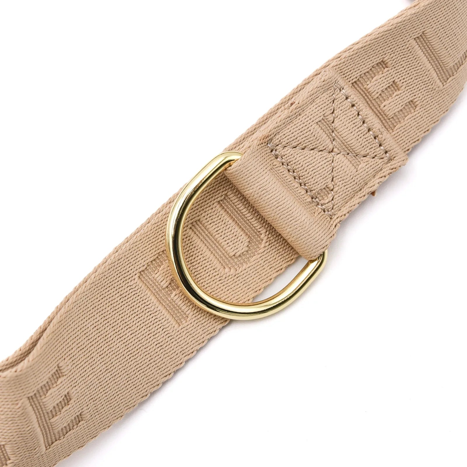Adjustable sand-colored nylon belt with gold D-ring and embossed logo, designed for the Elise Galleria Dog Walking Bag.