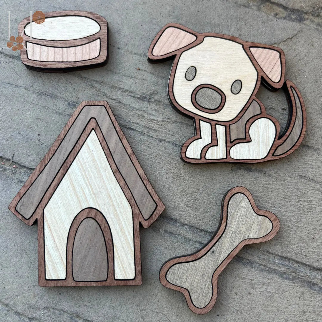 Handcrafted wood magnets featuring a dog, bone, doghouse, and food bowl, showcasing unique grain and rustic charm.