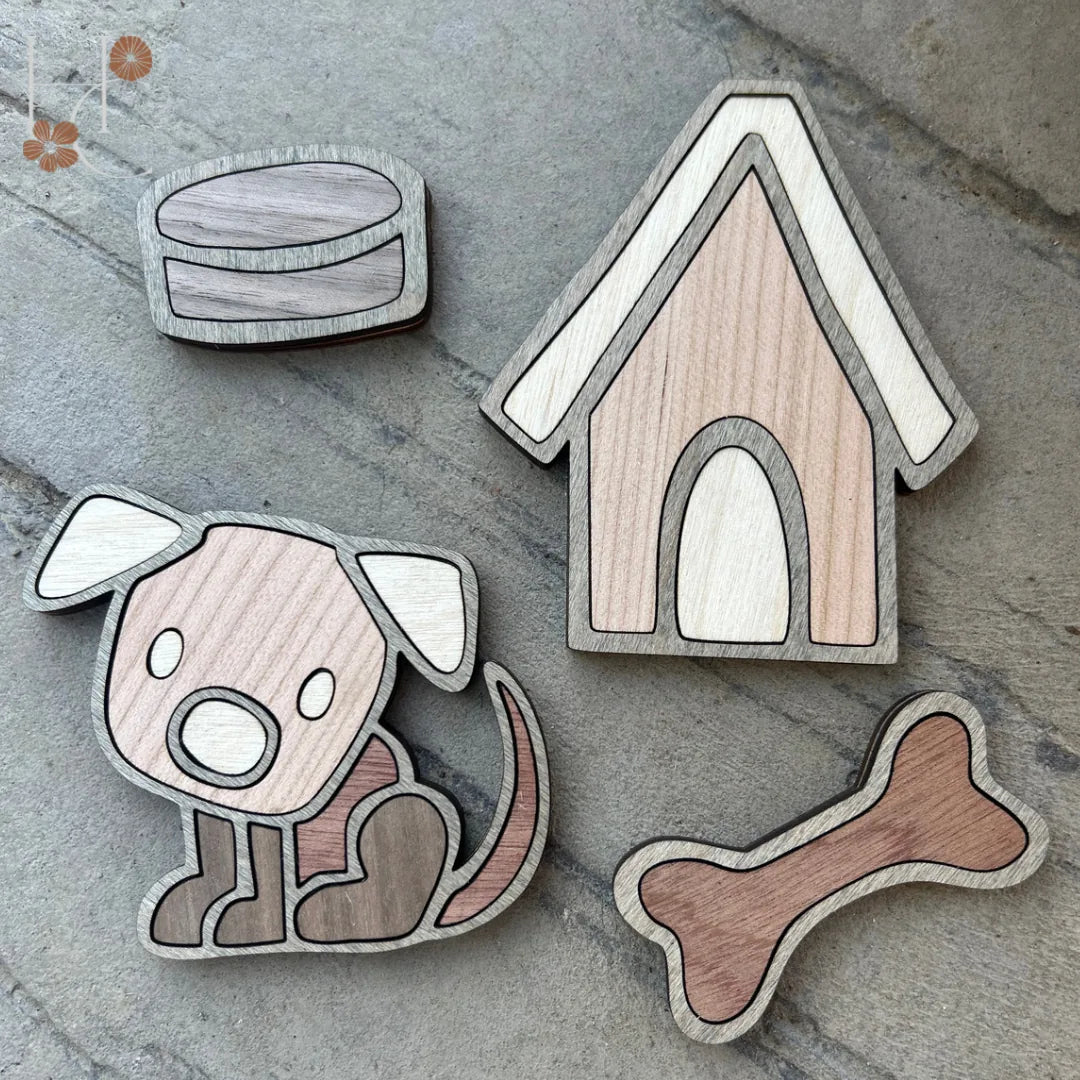 Handcrafted wooden dog magnets in various shapes, featuring a dog, house, bone, and dog bowl with natural wood tones.