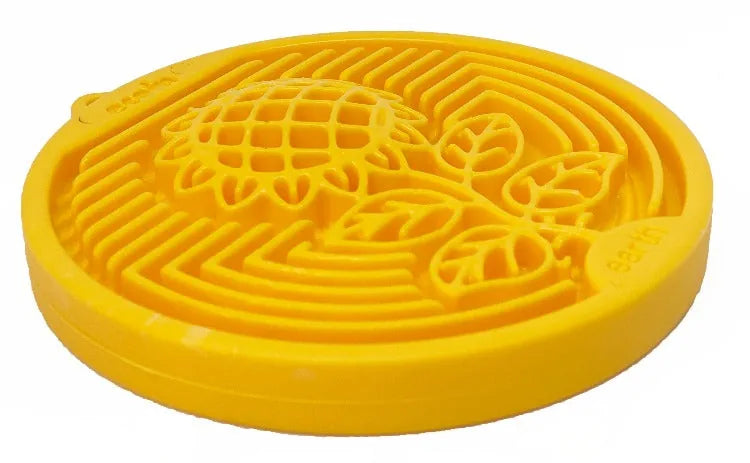 Durable yellow nylon lick mat featuring a sunflower design, ideal for encouraging slow feeding and mental stimulation.