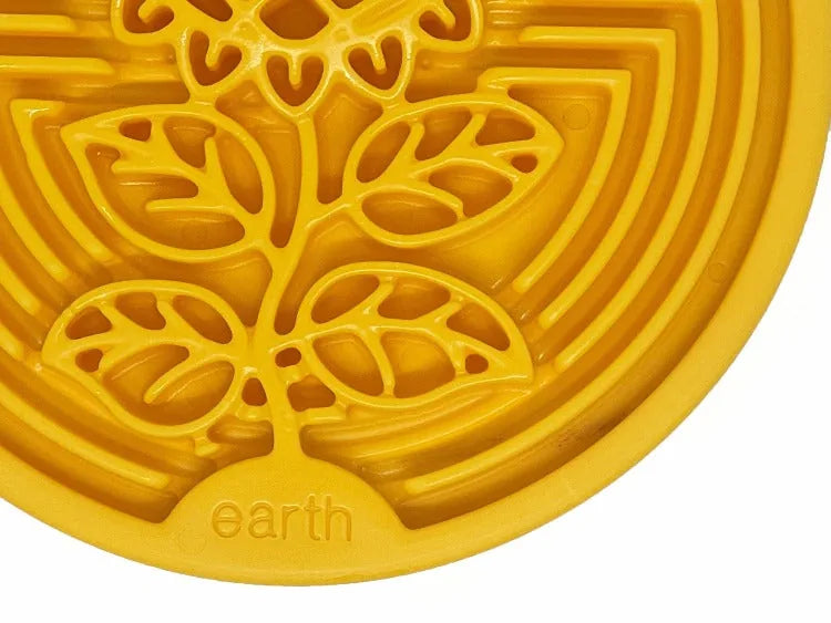 Yellow nylon lick mat featuring an earth-themed sunflower design, ideal for dog enrichment and anxiety relief.