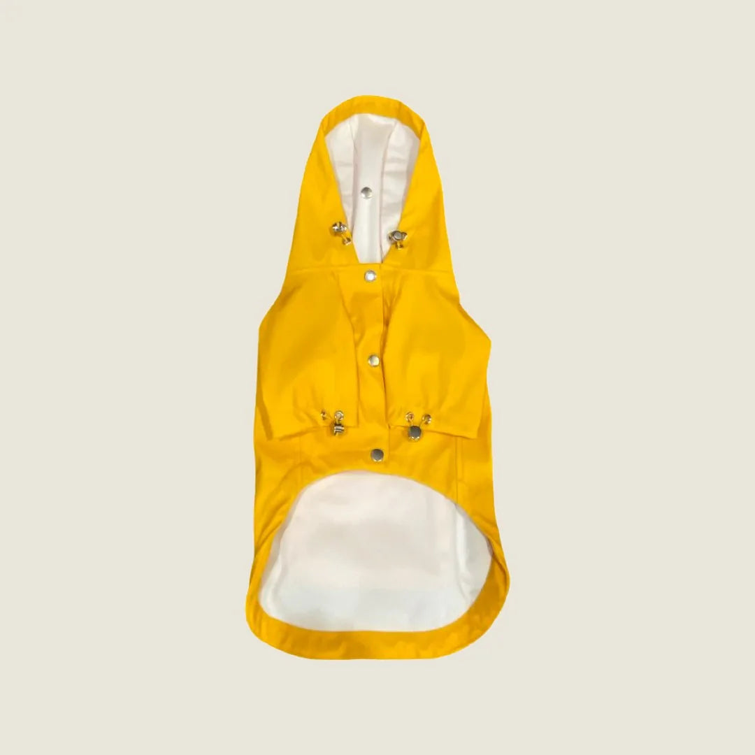 Bright yellow water-repellent pet raincoat with adjustable straps and a sleek design, ideal for rainy walks.