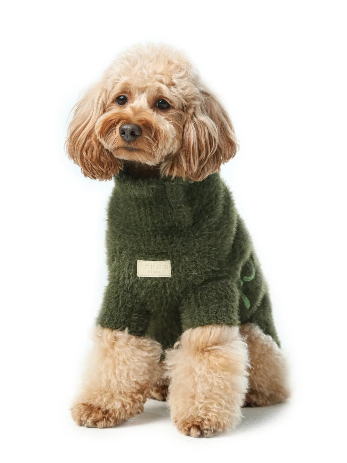 Cozy green Eskimo fuzzy sweater for dogs, crafted from breathable acrylic, featuring stretchable openings for easy wear.