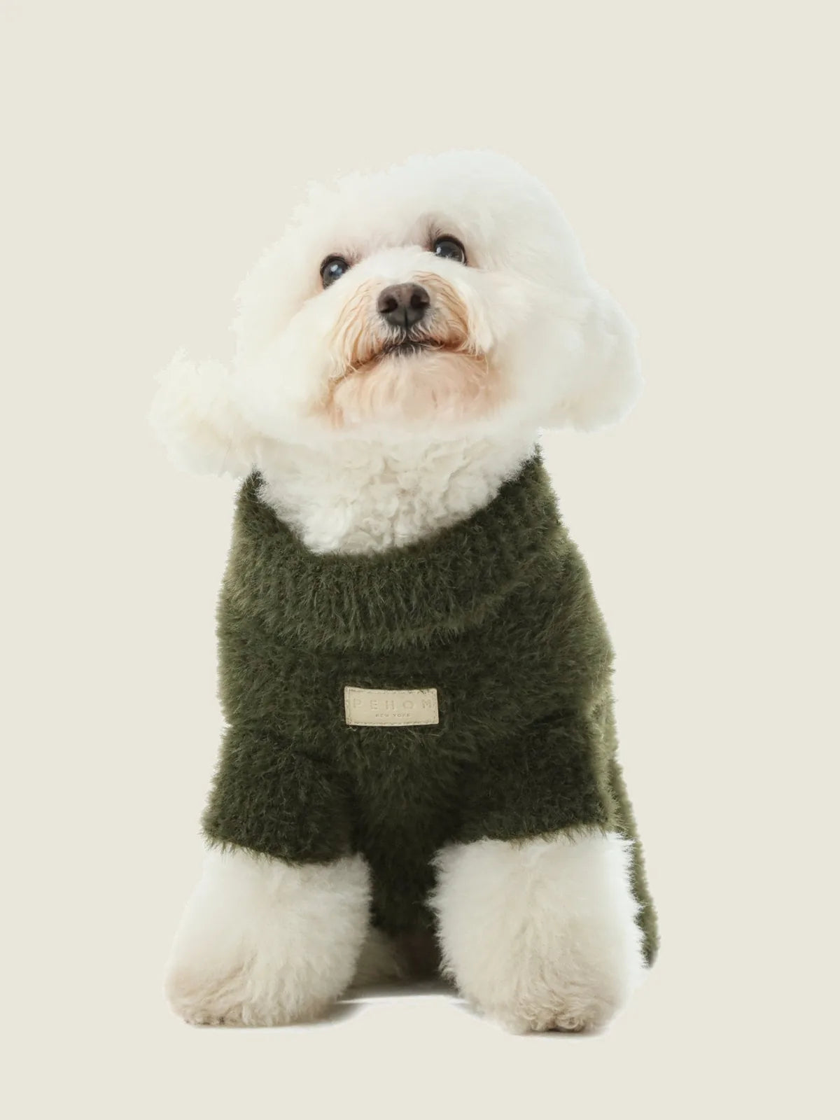 Cozy green Eskimo fuzzy sweater for dogs made with breathable acrylic fiber, perfect for warmth and comfort.
