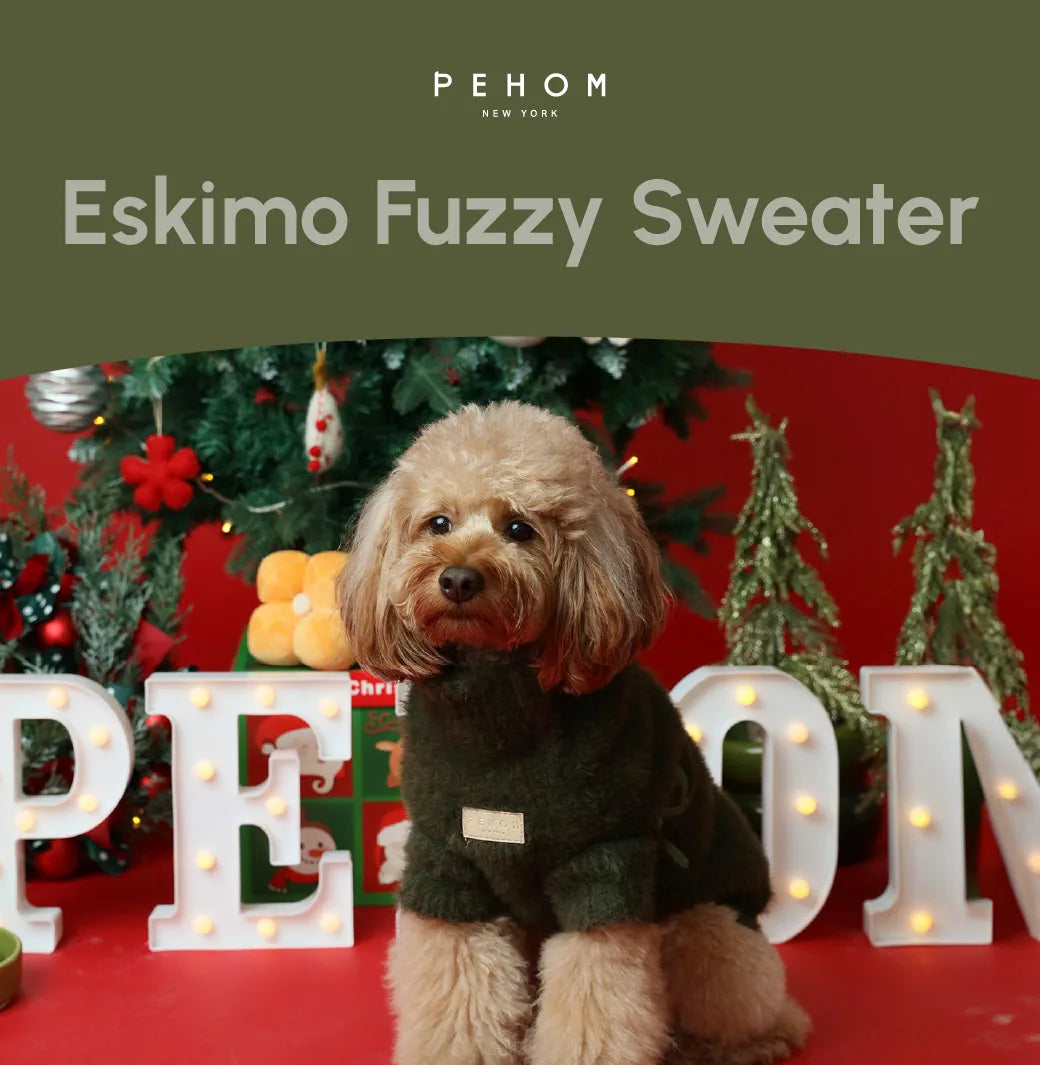 Cozy green Eskimo Fuzzy Sweater on a fluffy dog, set against festive decor and holiday decorations.