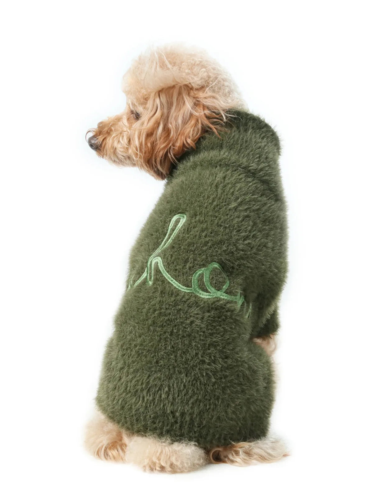 Cozy green fuzzy dog sweater with embroidered design, perfect for warmth and comfort in chilly weather.