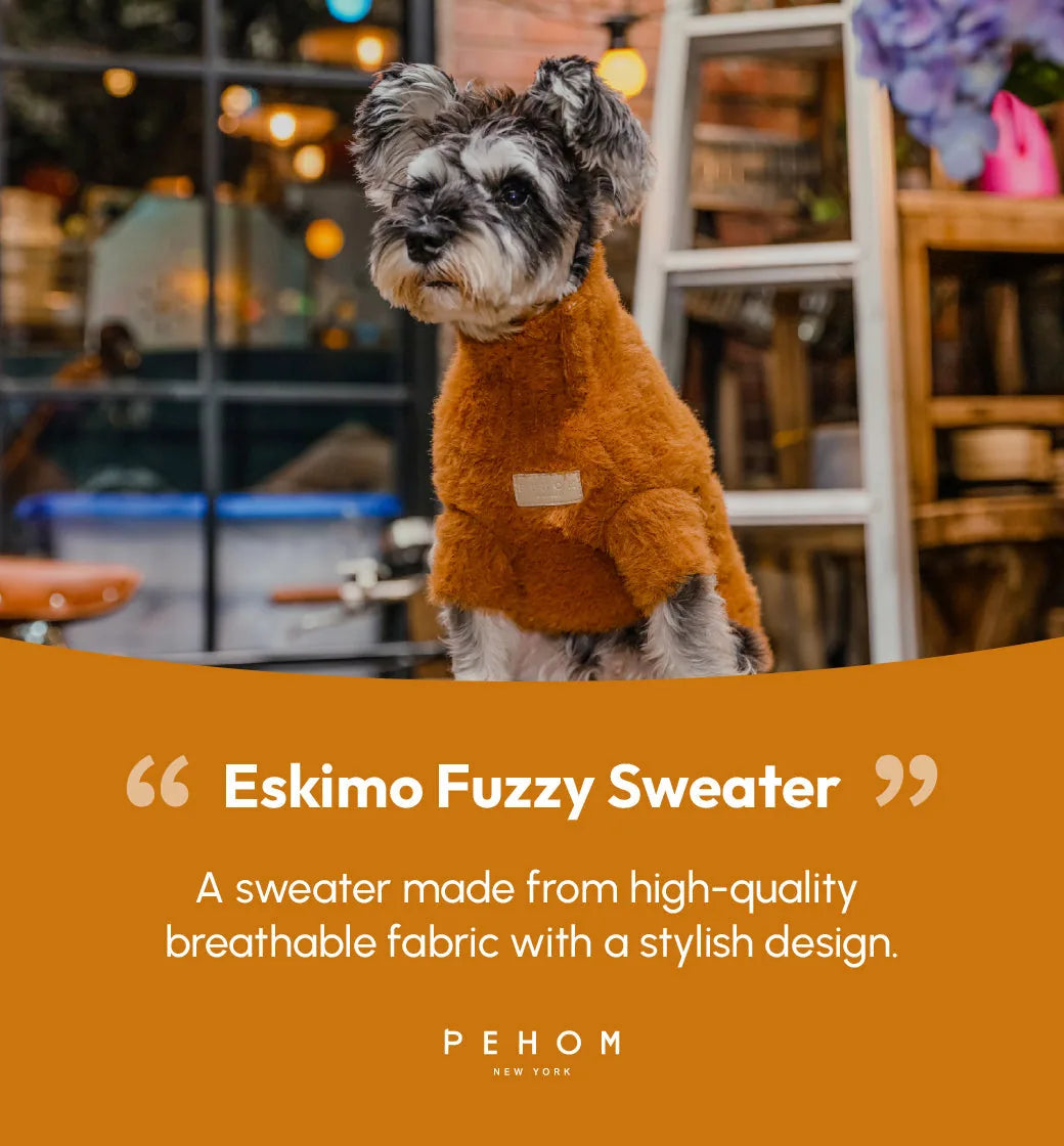 Orange Eskimo Fuzzy Sweater on a dog, showcasing a cozy design with a soft, breathable fabric.