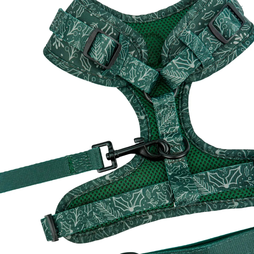 Evergreen Dream Adjustable Harness featuring a green floral print and breathable lining, designed for comfort and adjustab...