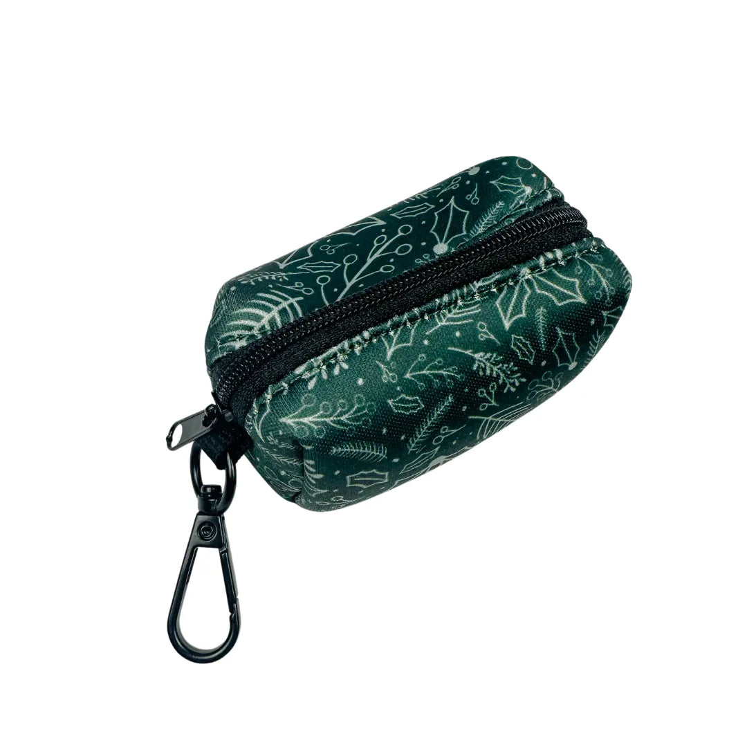 Dark green waste bag pouch with white botanical patterns and a zip closure, featuring a black swivel clip for easy attachm...