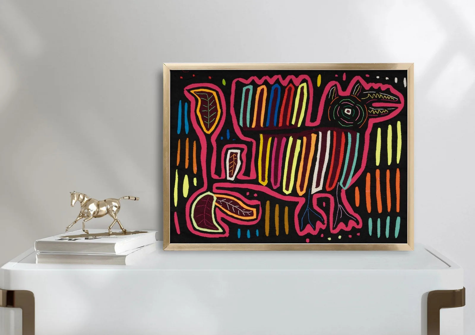Colorful hand-stitched Mola featuring a dog design, set against a black background with vibrant geometric patterns.