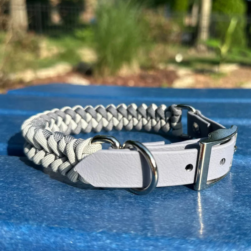 Handmade gray braided dog collar featuring adjustable BioThane® adapter and nickel-plated hardware.