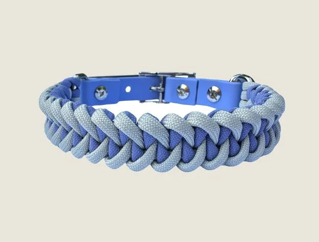 Handmade braided dog collar in lavender and smoke, featuring a periwinkle buckle and durable nylon paracord.