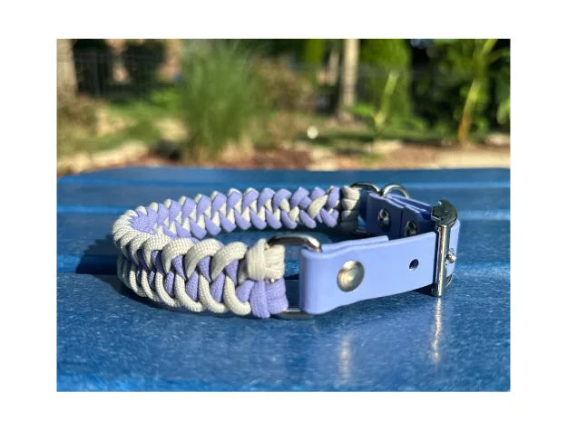 Handmade braided dog collar in lavender and smoke colors with a periwinkle buckle and sturdy silver hardware.