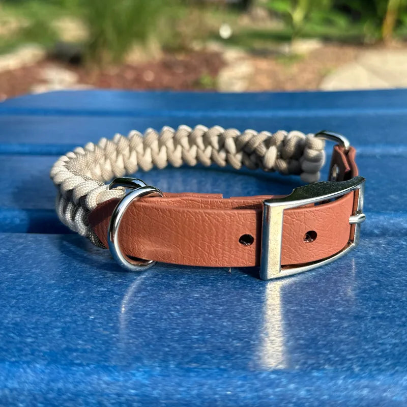 Handmade tan and cream fishtail braided dog collar with a durable BioThane® strap and silver hardware.