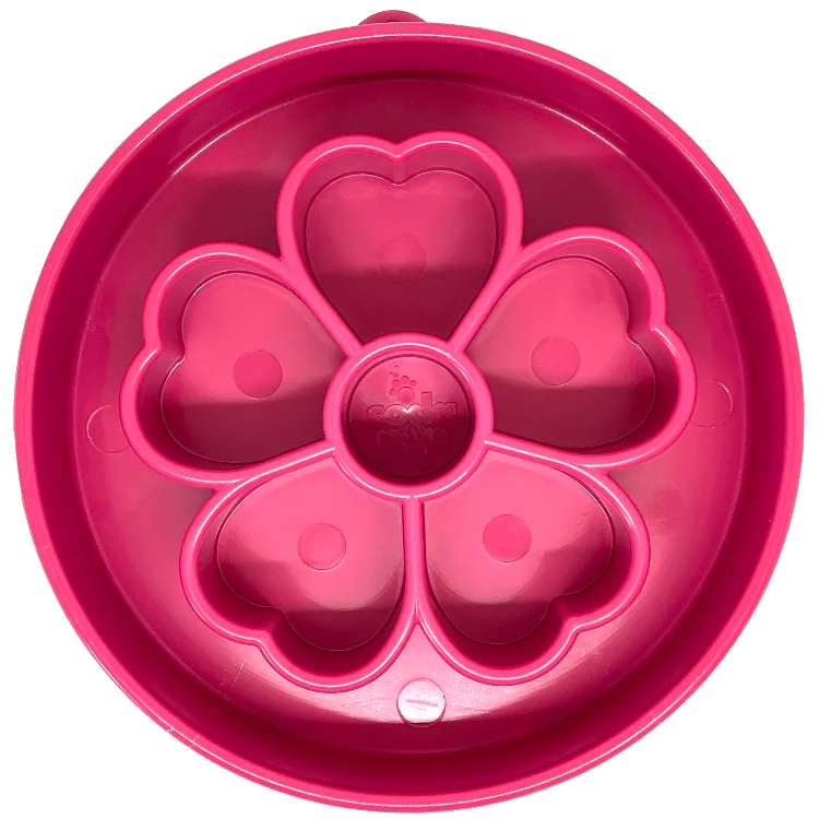 Deep pink flower-shaped slow feeder bowl with segmented chambers for engaging mealtime experiences.