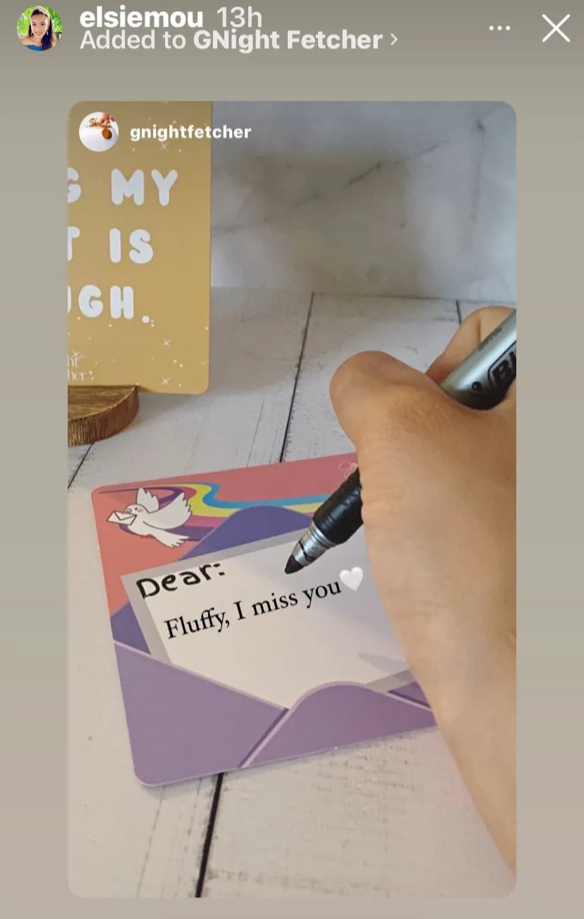 Colorful comfort card with a handwritten note saying "Dear: Fluffy, I miss you," alongside an illustration of a dove.