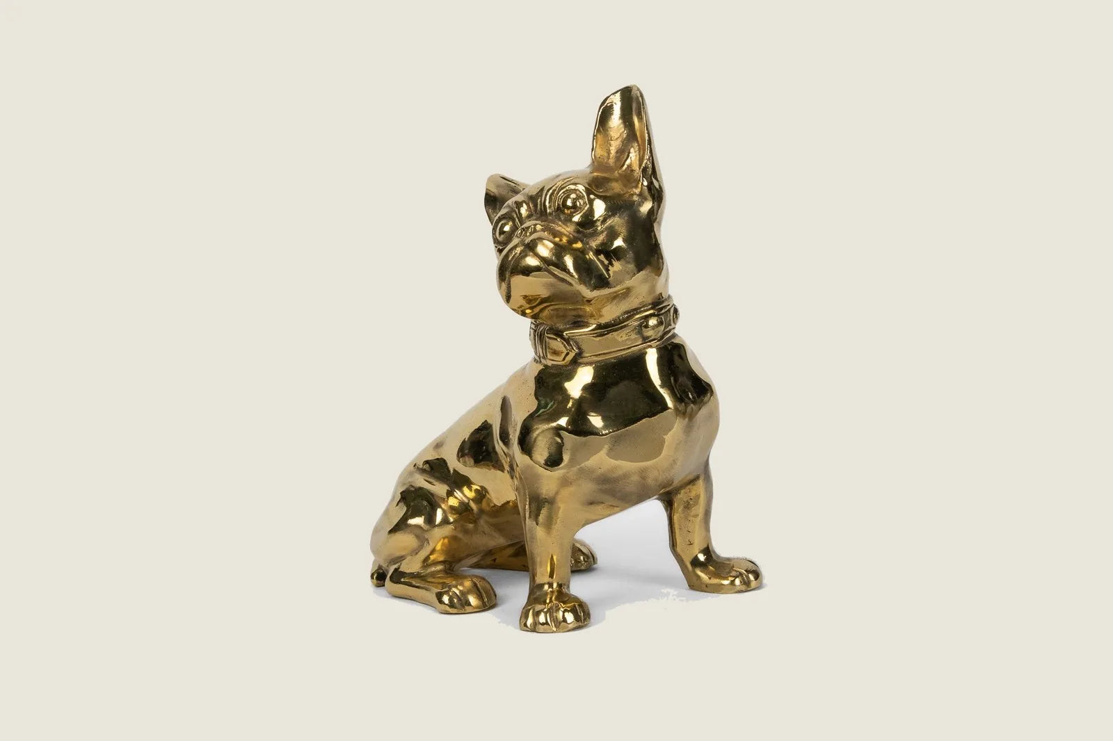 Handcrafted brass French Bulldog sculpture, polished for a glossy finish, showcasing a sleek design and details.