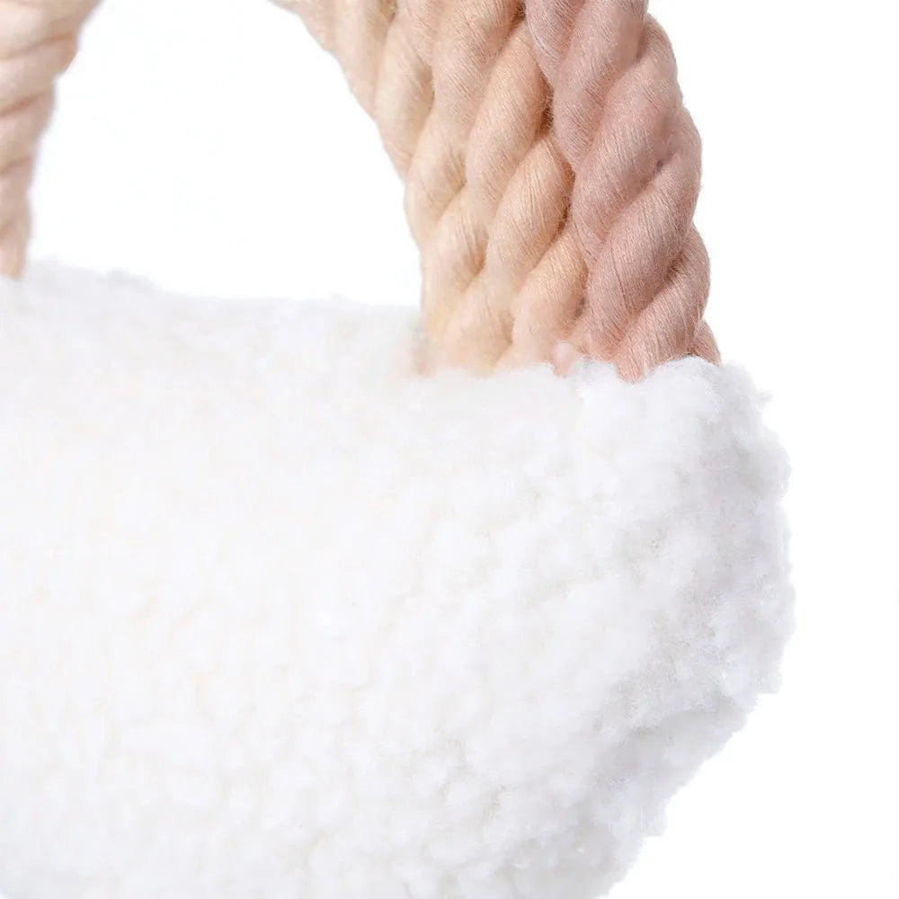 Soft white sherpa fabric dog toy with pastel cotton ropes, perfect for tug-of-war and chewing fun.