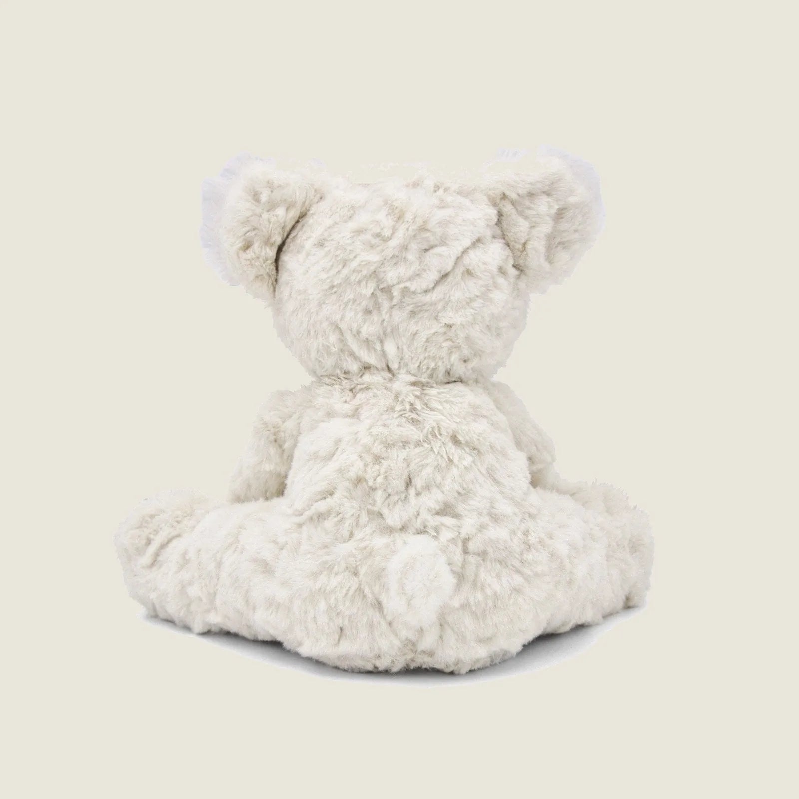 Soft beige plush Koko Koala dog toy with crinkly ears and hand-stitched details, perfect for cuddly play.