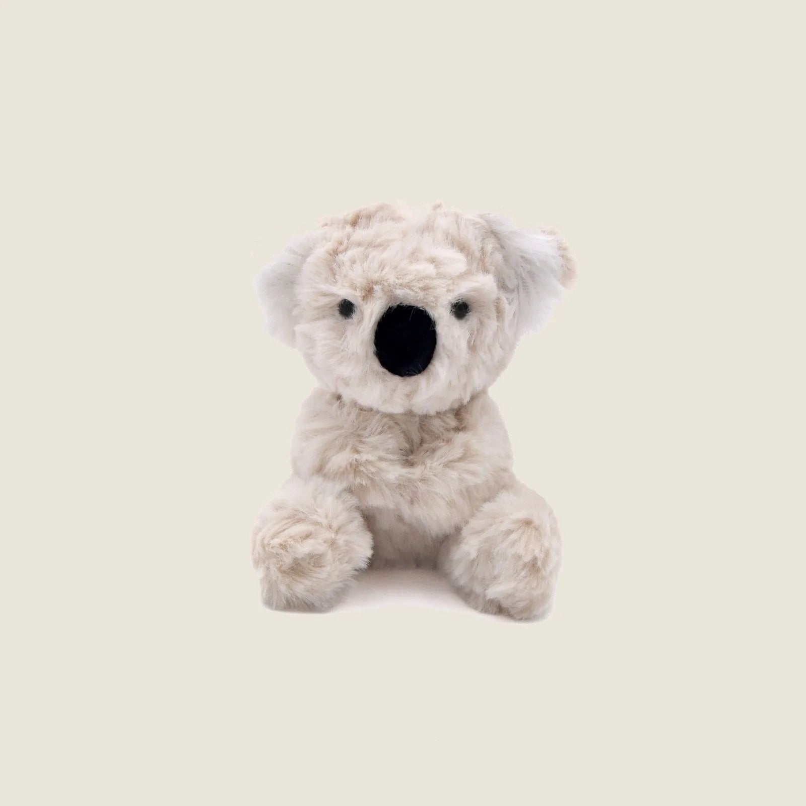 Mini Koko the Koala plush toy in soft beige fur, featuring black stitched nose and ears, designed for gentle dog play.