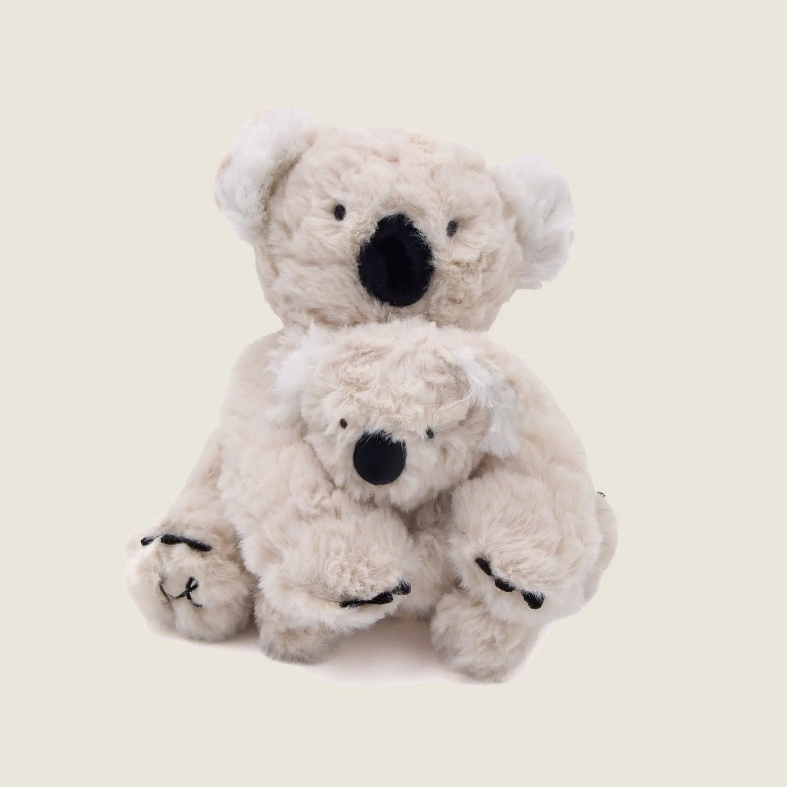 Plush Koko koala toy set in soft beige, featuring crinkle ears and a smiling expression, perfect for gentle dog play.