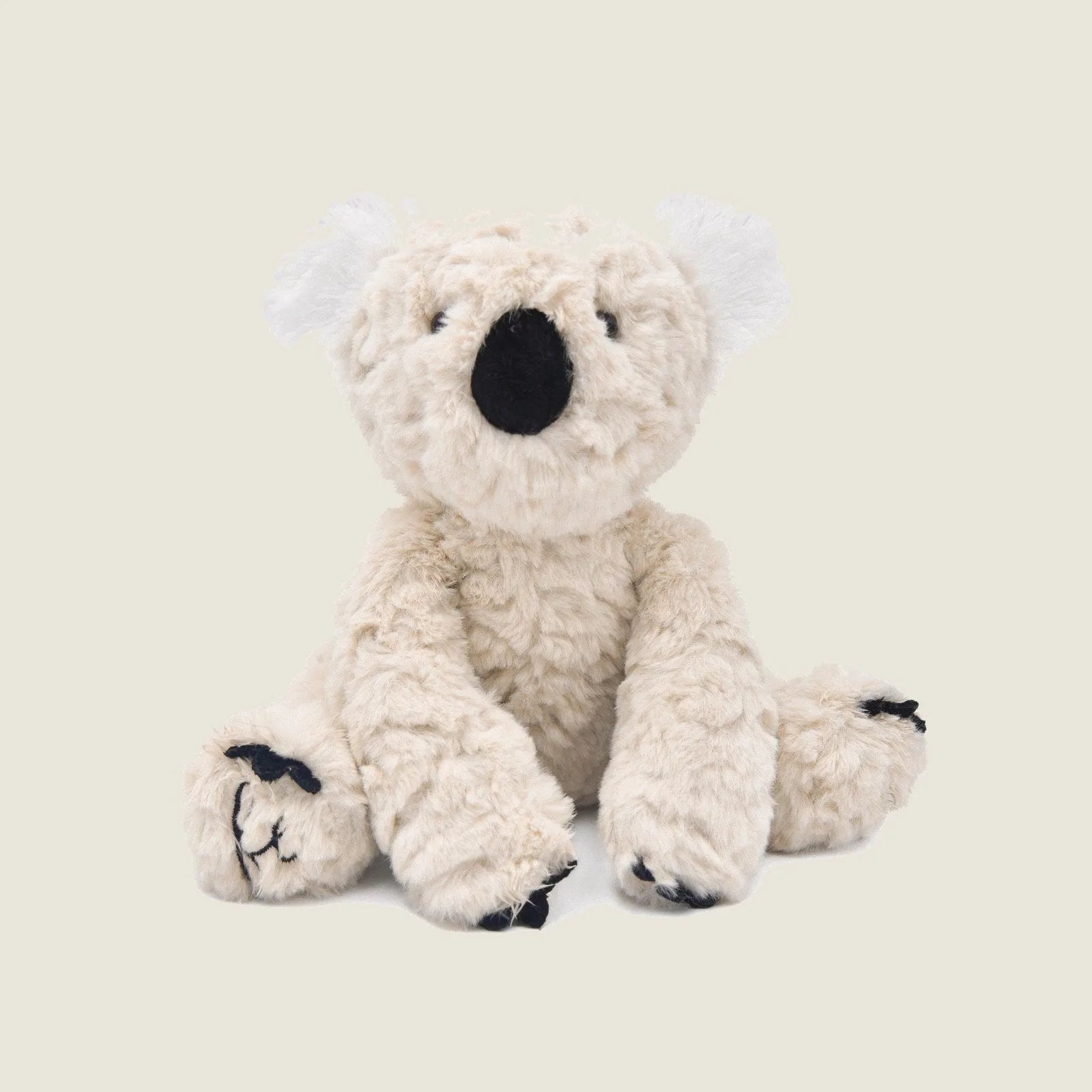 Soft, beige koala plush toy with crinkle ears and a black nose, perfect for gentle play and cuddling.