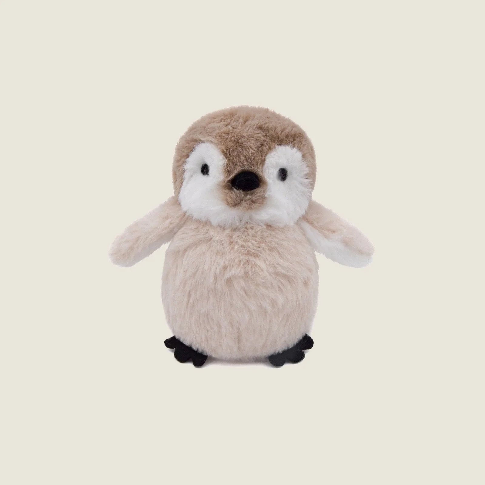 Soft plush mini penguin toy with crinkly wings, black feet, and hand-stitched features, perfect for gentle dog play.