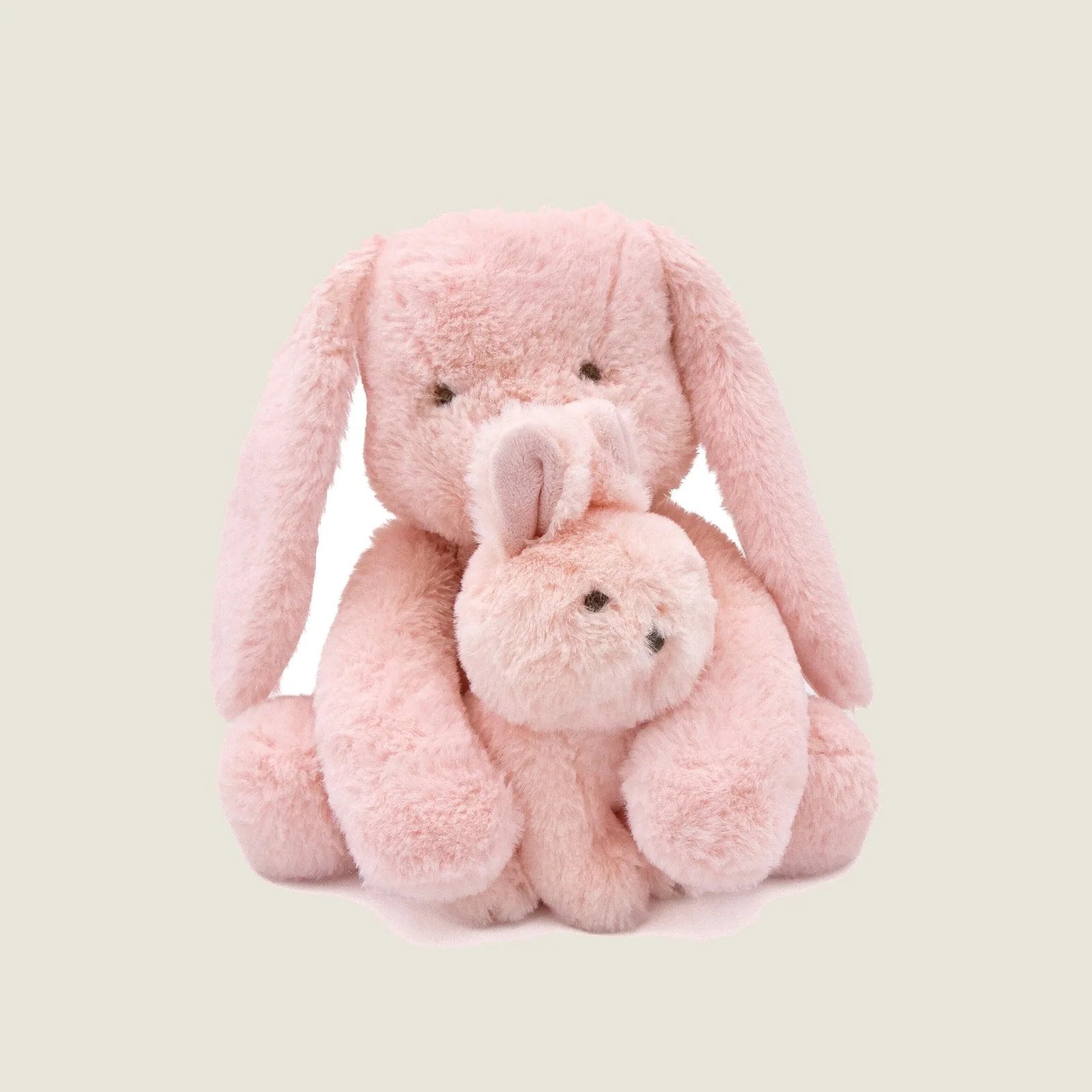 Plush pink bunny toy set with soft fur, featuring a larger and smaller plushie cuddling together.